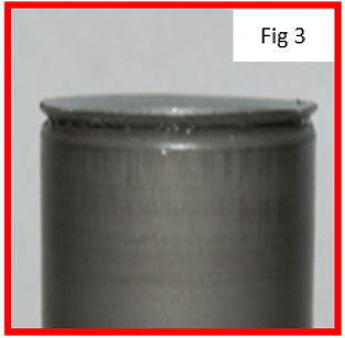The piston retaining ring has deformation or rippling. This shows that the cylinder has been overstroked